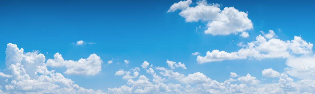 Blue Sky Background With Tiny Clouds